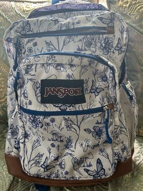 Jansport White Backpack with Blue Floral & Butterfly Print